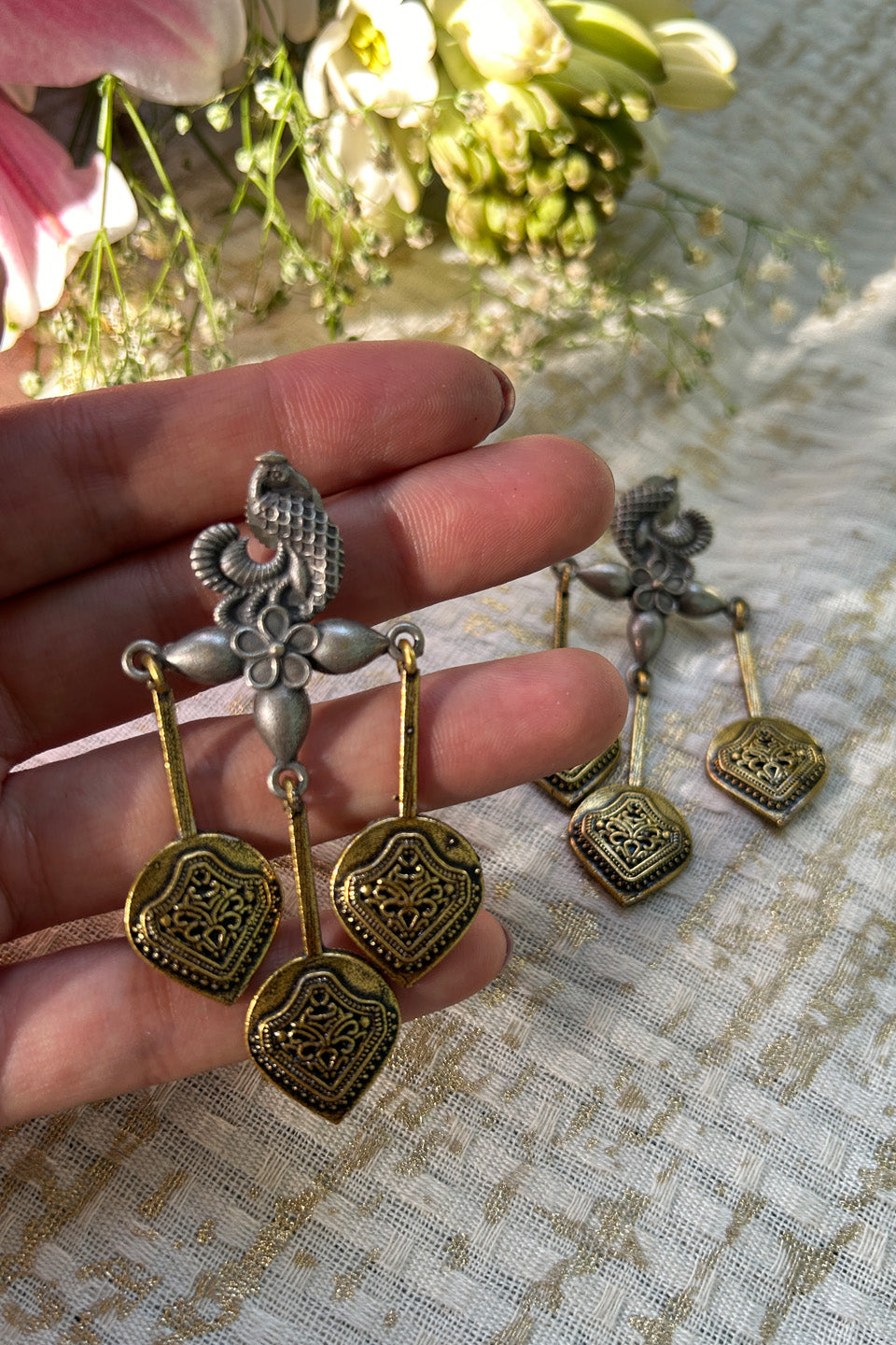 Dual-Tone Ethnic Dangle Earrings with Peacock Design