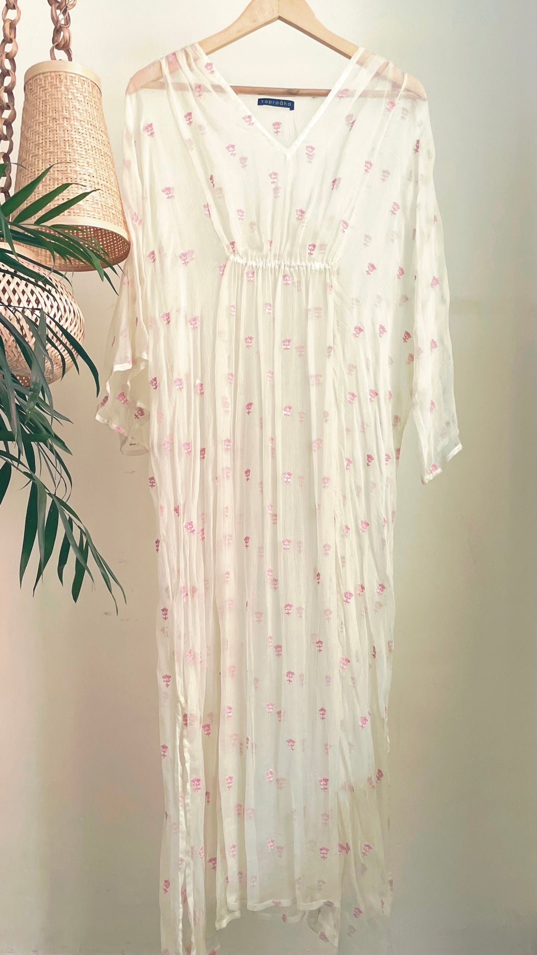 Lemon chiffon kaftan with pink embroidered motifs