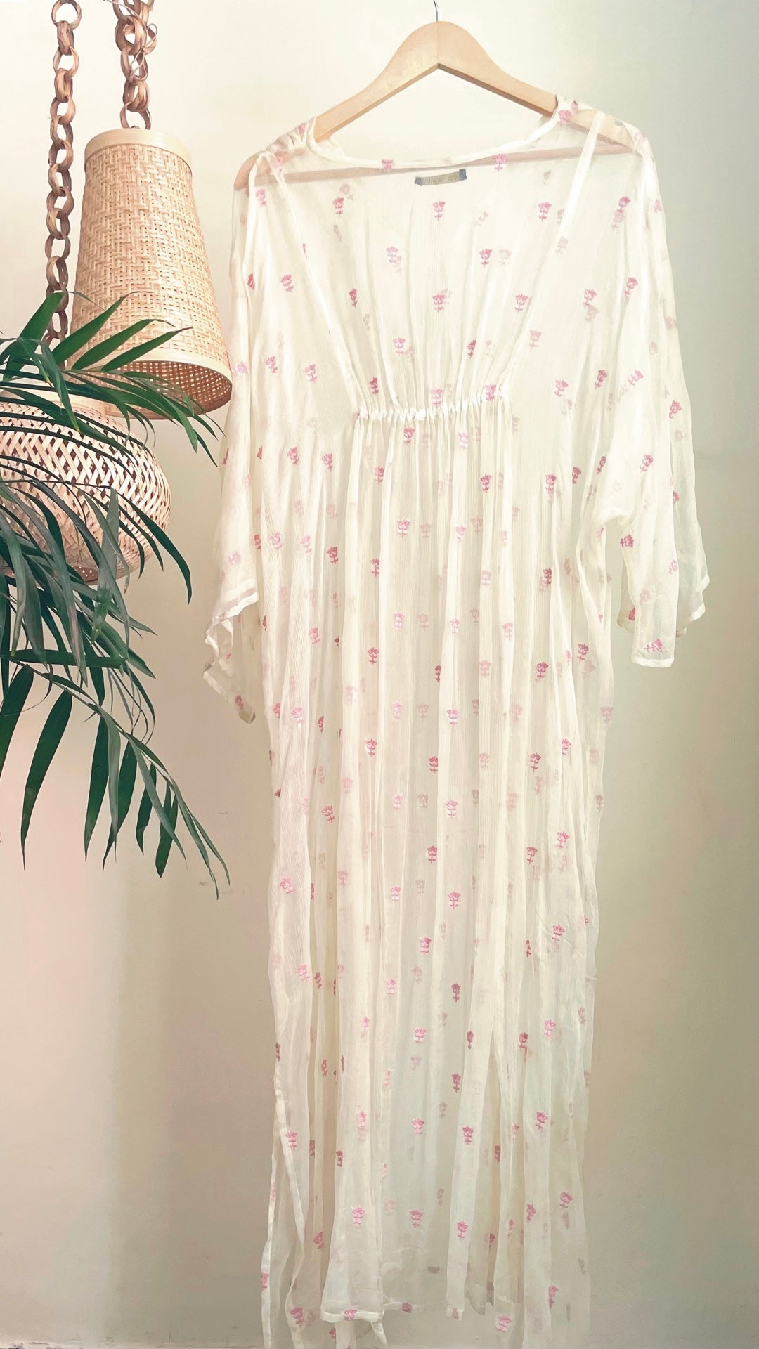 Lemon chiffon kaftan with pink embroidered motifs